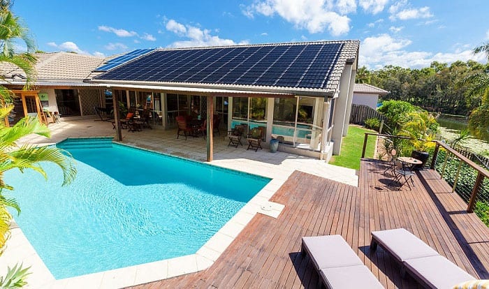 how many solar panels do I need to heat a swimming pool